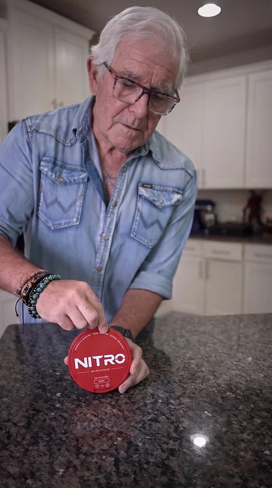 A Nitro customer holding the product